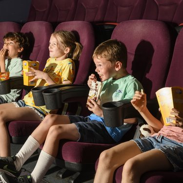 Kids Enjoying a movie at Broadway Cinema